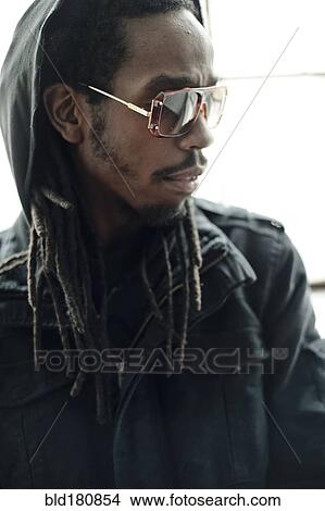 Black man wearing sunglasses View Large Photo Image Picture - Black man wearing sunglasses. Fotosearch
