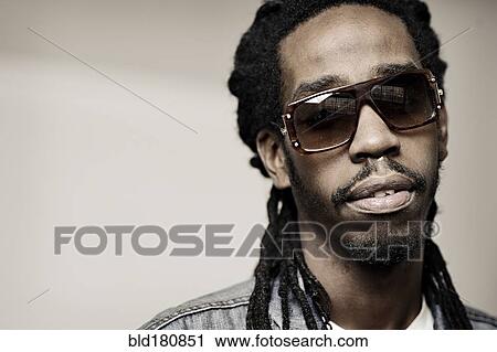 Black man wearing sunglasses View Large Photo Image Stock Image - Black man wearing sunglasses. Fotosearch