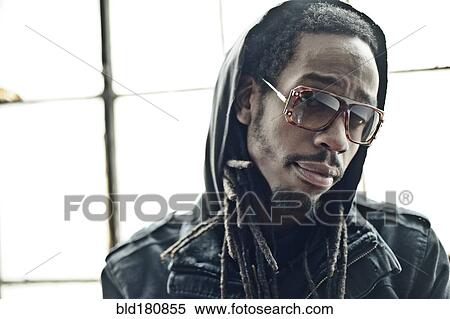 Stock Photography - Black man wearing sunglasses. Fotosearch