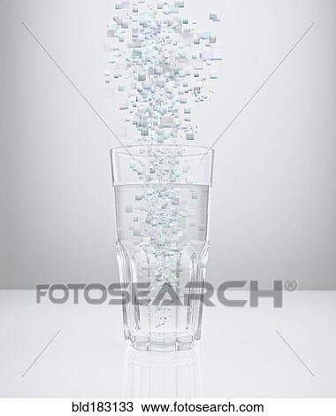 Blocks raining into water glass View Large Photo Image Stock Image - Blocks raining into water glass. Fotosearch