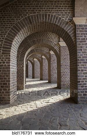 Stock Image - Brick archways in restored amphitheater. Fotosearch