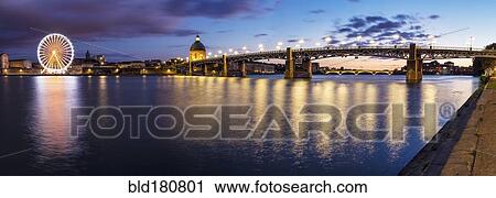 Stock Image - "Bridge and Nice cityscape at sunset, Provence Alpes Cate d'Azur, France". Fotosearch