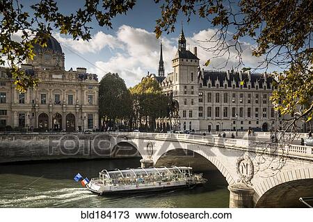 Buildings and bridge over river in Paris, Ile-de-France, France View Large Photo Image Stock Image - Buildings and bridge over river in Paris, Ile-de-France, France. Fotosearch
