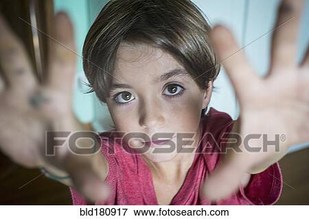 Stock Photo - Caucasian boy reaching up. Fotosearch
