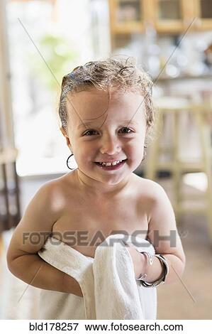 Caucasian boy wrapped in towel View Large Photo Image Stock Photo - Caucasian boy wrapped in towel. Fotosearch