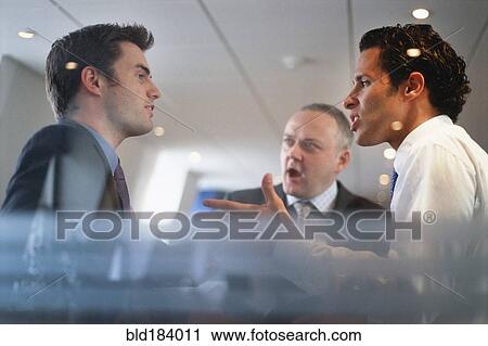 Caucasian businessmen arguing in office View Large Photo Image Stock Image - Caucasian businessmen arguing in office. Fotosearch