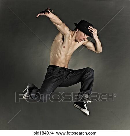 Caucasian dancer jumping for joy View Large Photo Image Picture - Caucasian dancer jumping for joy. Fotosearch