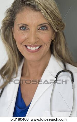 Stock Photograph - Caucasian doctor smiling. Fotosearch