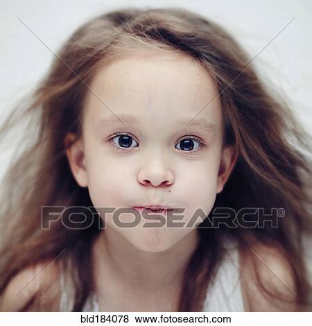Stock Photo - Caucasian girl holding her breath. Fotosearch