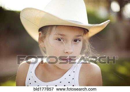 Caucasian girl in cowboy hat View Large Photo Image Stock Photo - Caucasian girl in cowboy hat. Fotosearch
