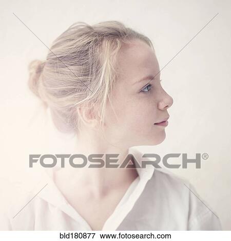 Stock Photo - Caucasian girl looking sideways. Fotosearch