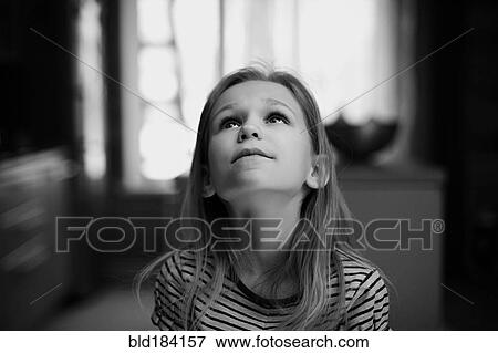 Caucasian girl looking up View Large Photo Image Stock Photo - Caucasian girl looking up. Fotosearch