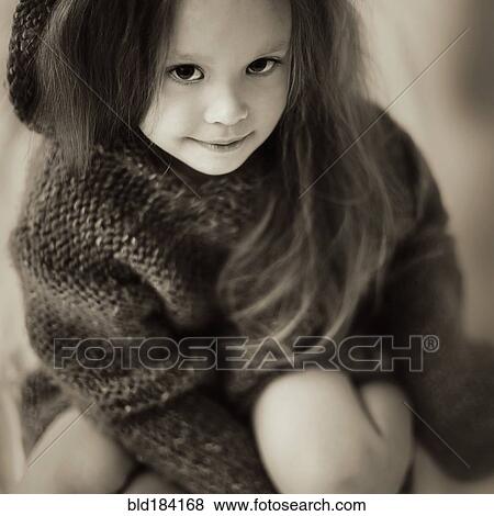 Caucasian girl wearing knitted sweater View Large Photo Image Stock Photo - Caucasian girl wearing knitted sweater. Fotosearch