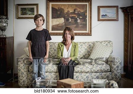Caucasian grandmother and grandson in living room View Large Photo Image Picture - Caucasian grandmother and grandson in living room. Fotosearch