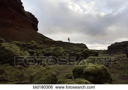 Caucasian hiker walking on rock formation View Large Photo Image Stock Photograph - Caucasian hiker walking on rock formation. Fotosearch