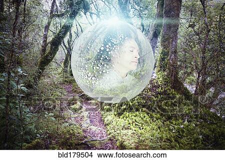 Caucasian man in glowing orb in forest View Large Photo Image Picture - Caucasian man in glowing orb in forest. Fotosearch