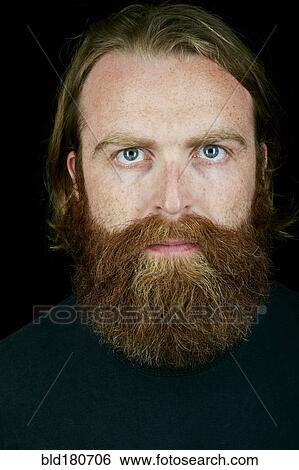 Caucasian man with serious expression View Large Photo Image Stock Photograph - Caucasian man with serious expression. Fotosearch