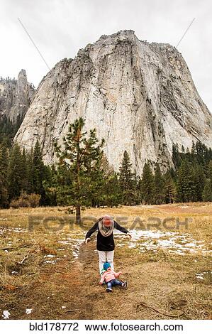 Stock Image - "Caucasian mother and daughter in Yosemite National Park, California, United States". Fotosearch