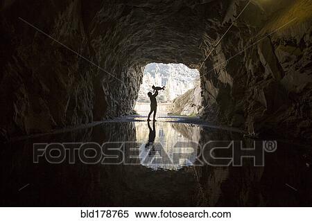 Caucasian mother and daughter playing in cave View Large Photo Image Stock Photography - Caucasian mother and daughter playing in cave. Fotosearch