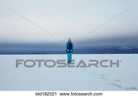 Caucasian teenage girl walking in snow View Large Photo Image Stock Image - Caucasian teenage girl walking in snow. Fotosearch
