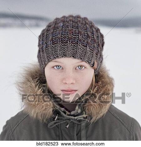 Caucasian teenage girl wearing beanie hat in snow View Large Photo Image Stock Image - Caucasian teenage girl wearing beanie hat in snow. Fotosearch