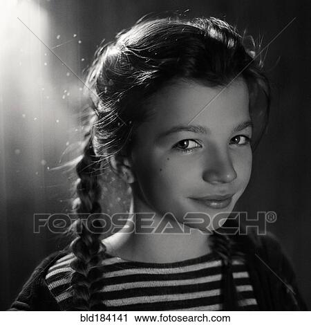 Caucasian teenage girl wearing braids View Large Photo Image Stock Image - Caucasian teenage girl wearing braids. Fotosearch