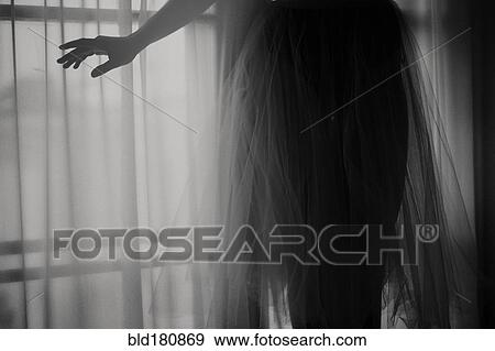 Stock Photo - Caucasian teenage girl wearing gauzy skirt. Fotosearch