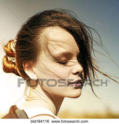 Caucasian teenage girl with eyes closed outdoors View Large Photo Image Stock Photograph - Caucasian teenage girl with eyes closed outdoors. Fotosearch