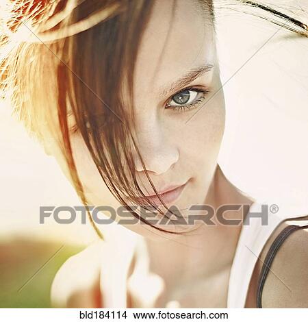 Picture - Caucasian teenage girl with messy hair. Fotosearch