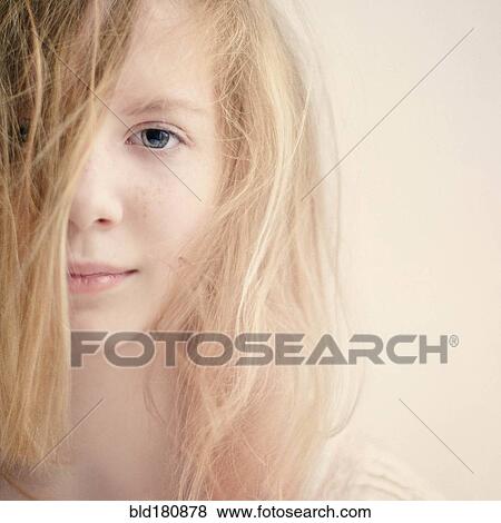 Stock Photo - Caucasian teenage girl with messy hair. Fotosearch