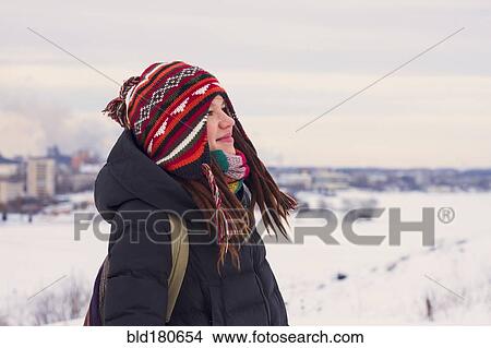 Caucasian woman admiring snowy landscape View Large Photo Image Picture - Caucasian woman admiring snowy landscape. Fotosearch