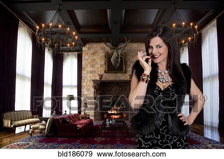Caucasian woman eating beef in ornate sitting room View Large Photo Image Stock Photo - Caucasian woman eating beef in ornate sitting room. Fotosearch