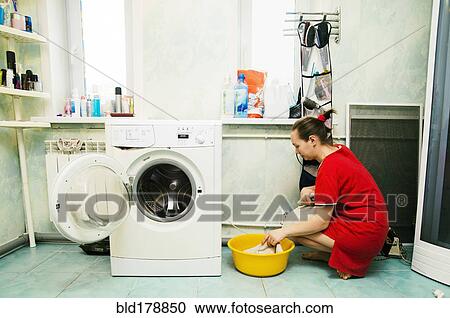 Caucasian woman hand-washing laundry View Large Photo Image Stock Image - Caucasian woman hand-washing laundry. Fotosearch