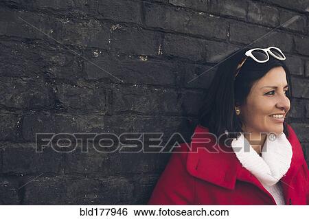 Stock Photograph - Caucasian woman smiling outdoors. Fotosearch