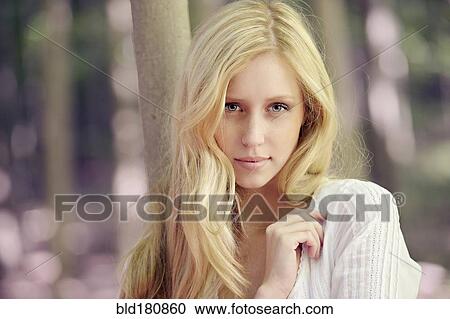 Caucasian woman standing outdoors View Large Photo Image Stock Image - Caucasian woman standing outdoors. Fotosearch