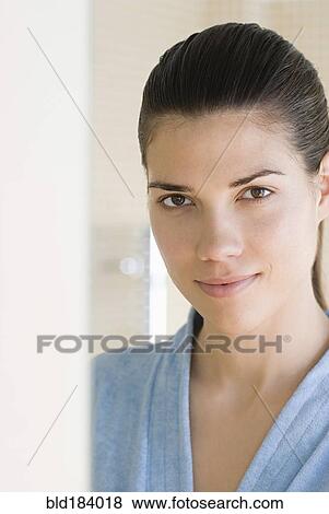 Stock Photo - Caucasian woman wearing bathrobe. Fotosearch