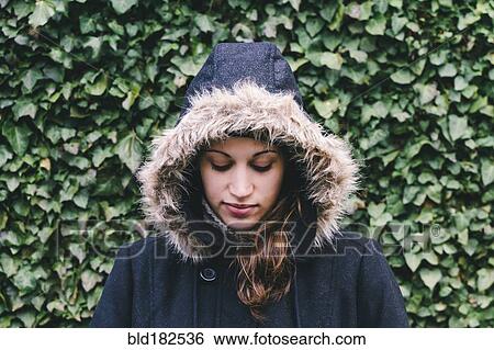 Caucasian woman wearing fur hood View Large Photo Image Stock Photograph - Caucasian woman wearing fur hood. Fotosearch