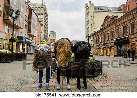 Caucasian women posing outdoors View Large Photo Image Stock Image - Caucasian women posing outdoors. Fotosearch