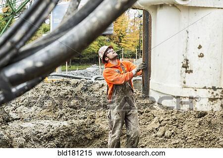 Caucasian worker at construction site View Large Photo Image Stock Photography - Caucasian worker at construction site. Fotosearch