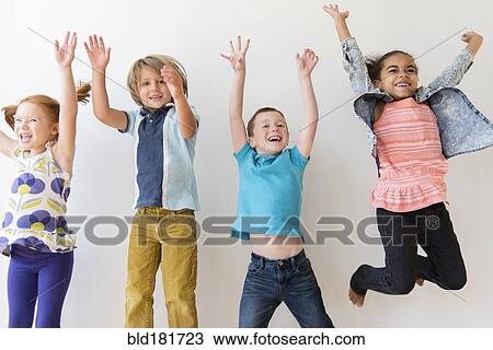 Stock Image - Children jumping for joy. Fotosearch