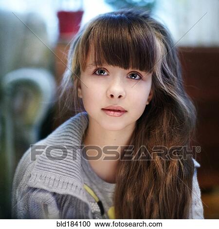 Stock Image - Close up of Caucasian girl with long hair. Fotosearch
