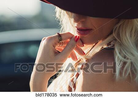 Close up of Caucasian woman looking down View Large Photo Image Stock Photography - Close up of Caucasian woman looking down. Fotosearch