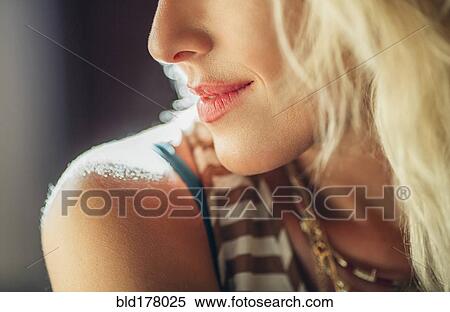 Stock Photography - Close up of Caucasian woman smiling. Fotosearch