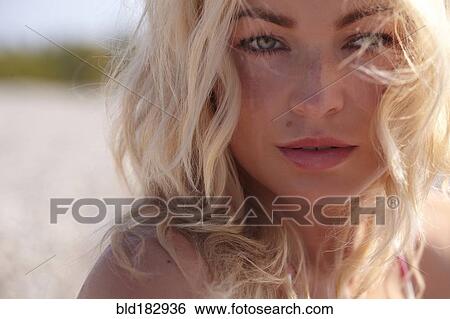 Close up of serious Caucasian woman View Large Photo Image Stock Photograph - Close up of serious Caucasian woman. Fotosearch