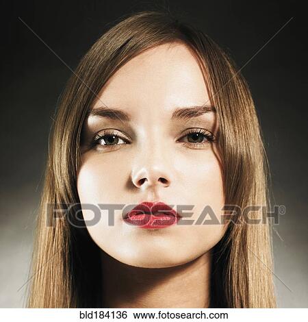 Stock Photograph - Close up of serious Caucasian woman. Fotosearch
