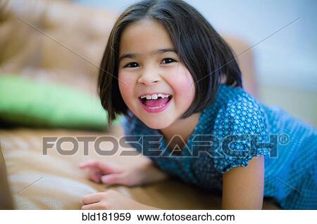 Close up of smiling girl View Large Photo Image Stock Photo - Close up of smiling girl. Fotosearch