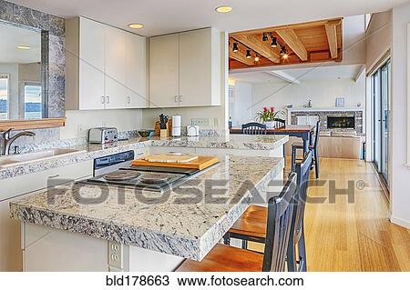 Stock Image - Countertops and cabinets in modern kitchen. Fotosearch