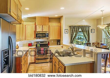 Stock Image - Countertops and cabinets in modern kitchen. Fotosearch