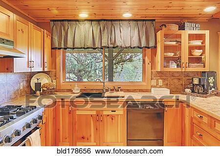 Countertops and cabinets in rustic kitchen View Large Photo Image Stock Photograph - Countertops and cabinets in rustic kitchen. Fotosearch