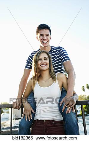 Couple smiling outdoors View Large Photo Image Stock Photography - Couple smiling outdoors. Fotosearch